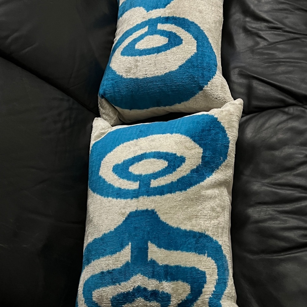 IKAT torquoise and pale gray throw pillows